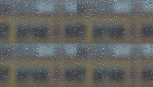 雨中的玻璃幕墙高清在线视频素材下载