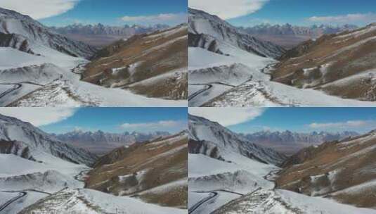 航拍新疆喀什塔县盘龙古道雪山公路高清在线视频素材下载