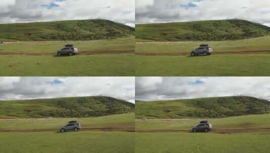 一辆车在西藏芒康草原越野行驶高清在线视频素材下载