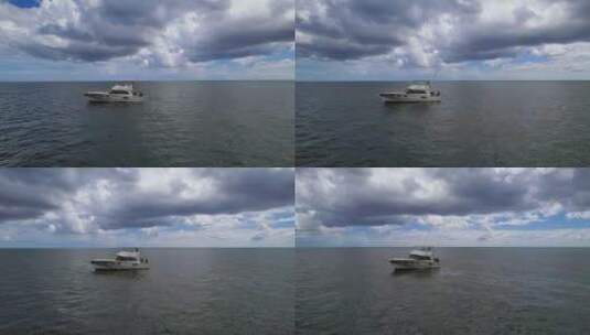 环绕航拍海面上的钓鱼船高清在线视频素材下载