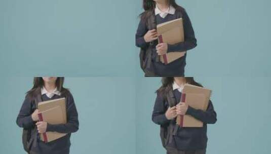 女孩背着书包去上学高清在线视频素材下载