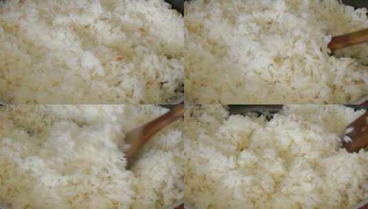将煮熟的米饭与米勺混合高清在线视频素材下载