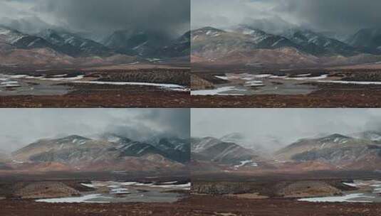 西藏旅游风光云雾笼罩彩色冈底斯山沼泽高清在线视频素材下载