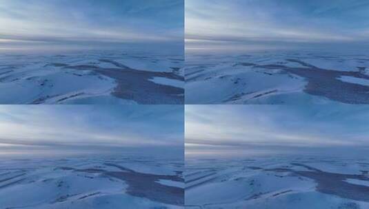 航拍冷空气笼罩的苍茫雪原夕照高清在线视频素材下载