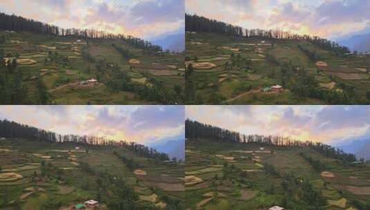 无人机拍摄卡索尔马纳利附近喜马偕尔邦塞恩吉山谷一个小村庄的日落高清在线视频素材下载