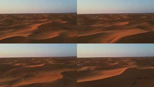 夕阳下金色的腾格里沙漠高清在线视频素材下载