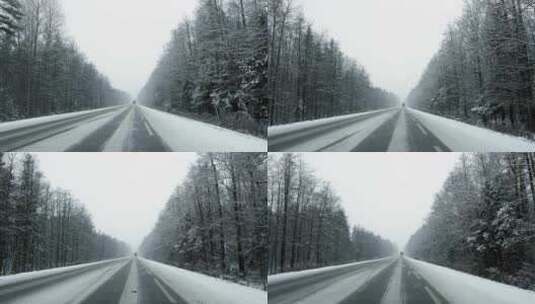 冬季POV在雪暴期间在白天的森林道路上驾驶卡车高清在线视频素材下载