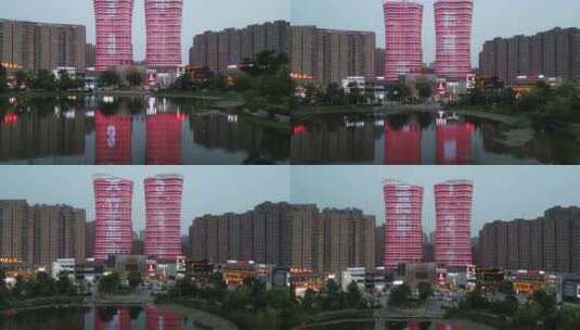 河南新乡市城市夜幕降临夜景灯光航拍高清在线视频素材下载