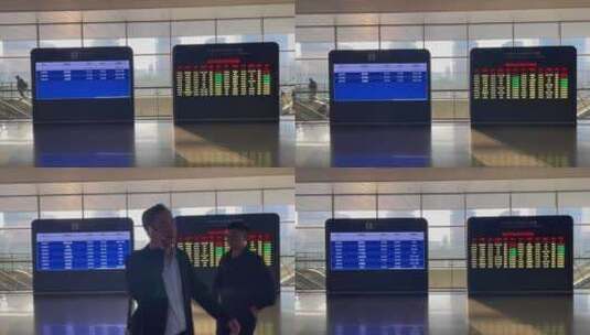 郑州东站车次信息屏电梯扶梯旅客人流高清在线视频素材下载