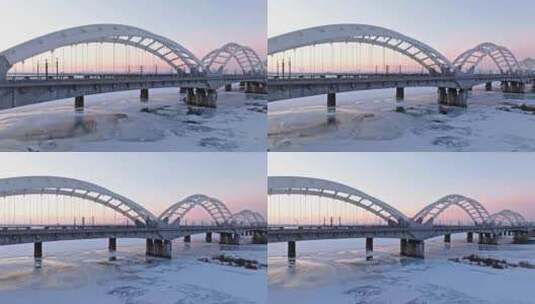 中国黑龙江哈尔滨松花江滨洲铁路桥航拍高清在线视频素材下载