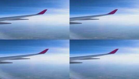 飞机在高空云层平流层上飞行巡航航行高清在线视频素材下载