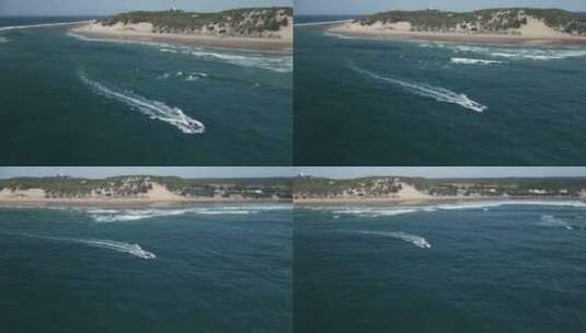 一架小船在莫桑比克波涛汹涌的海上航行的航高清在线视频素材下载