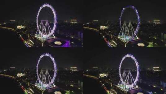 广东中山摩天轮地标夜景灯光航拍高清在线视频素材下载