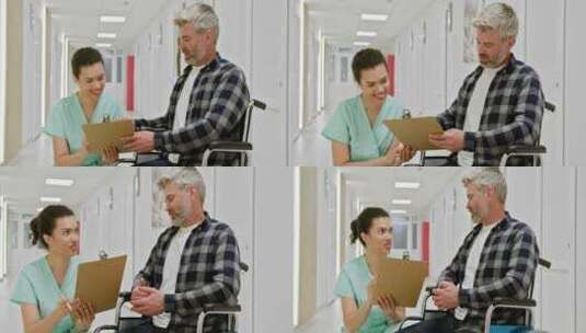 护士在医院走廊协助轮椅患者高清在线视频素材下载