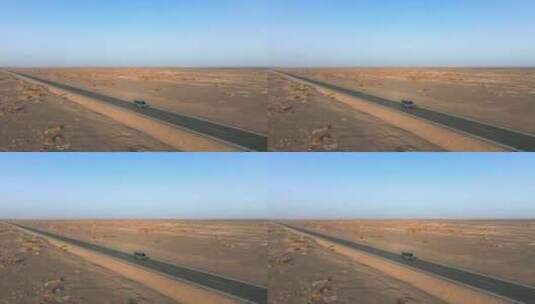 4K航拍汽车行驶在新疆无人区戈壁滩高清在线视频素材下载