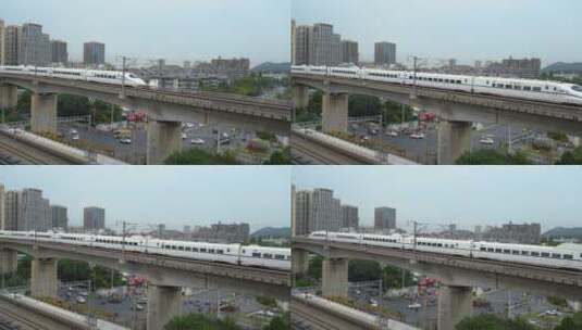 在城市中穿行的高铁动车和谐号高清在线视频素材下载