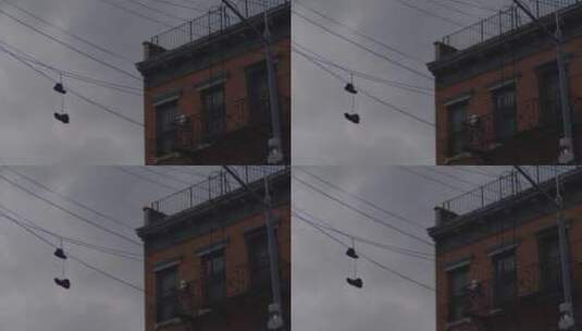 街道电线上挂着的鞋子高清在线视频素材下载
