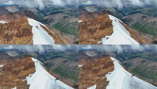 航拍攀登沙鲁里山脉尼登贡嘎雪山的登山者高清在线视频素材下载