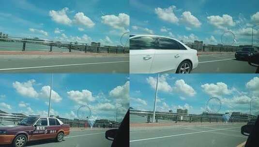 摩天轮 公路 开车拍摄 蓝蓝的天空 白云高清在线视频素材下载