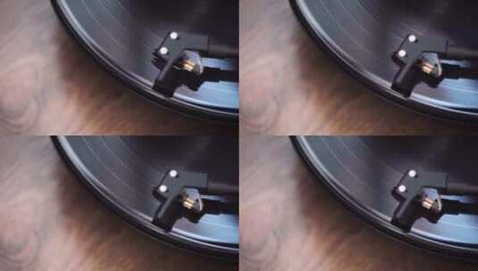 唱片特写镜头上的乙烯基拾音器。微距拍摄。高清在线视频素材下载