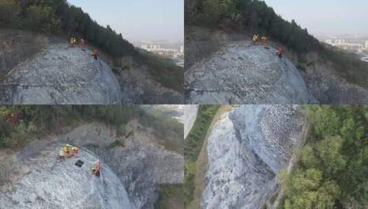 航拍消防员绳索攀岩训练高清在线视频素材下载