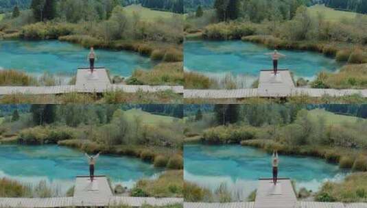 女人在湖边做瑜伽高清在线视频素材下载