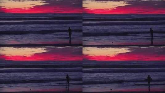 日落时分冲浪者从海里回到岸上高清在线视频素材下载