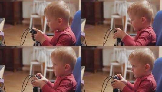 小男孩玩电子游戏高清在线视频素材下载