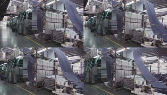 织布厂生产车间全自动织布机高清在线视频素材下载