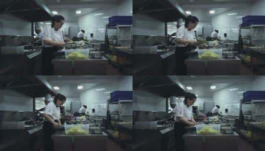 汽车4S店的餐厅后厨在做菜高清在线视频素材下载