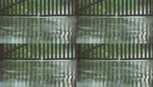 农村阴天下雨水滴木头门倒影高清在线视频素材下载