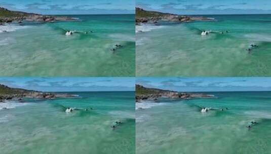西澳大利亚玛格丽特河红门海滩与冲浪者的鸟高清在线视频素材下载