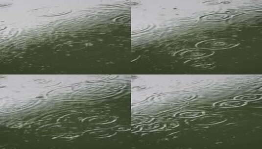 雨水雨滴落在湖面溅起水花波纹竖版竖屏高清在线视频素材下载