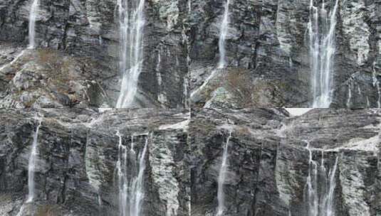 四川甘孜稻城亚丁风景区冰川融水形成的瀑布高清在线视频素材下载