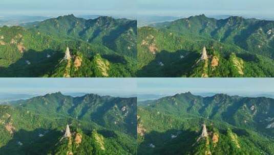 航拍绿色千山和大佛寺塔高清在线视频素材下载