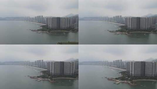 航拍惠州十里银滩沙滩和高楼建筑群高清在线视频素材下载
