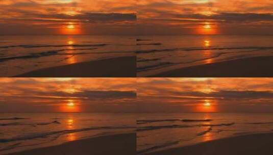 日落时海滩上翻滚的海浪高清在线视频素材下载