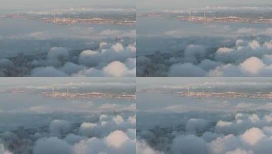 航拍威海经区城市街道上空的云海4K高清在线视频素材下载