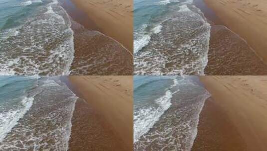 海浪冲向海岸的航拍高清在线视频素材下载