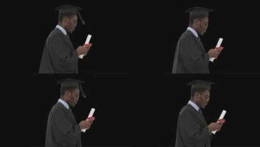 学士服毕业生看手机高清在线视频素材下载