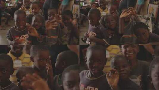 非洲孩子对着镜头挥手高清在线视频素材下载