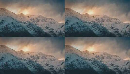 雪山之上唯美的落日夕阳云彩风景高清在线视频素材下载