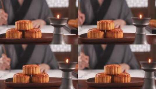古代文人墨客书房书桌木盘上广式月饼高清在线视频素材下载