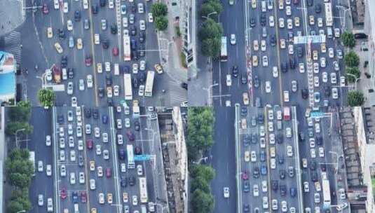 航拍城市上下班高峰期交通堵车的街景与车流高清在线视频素材下载