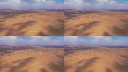 4k阿拉善沙漠中的风车风力发电航拍高清在线视频素材下载