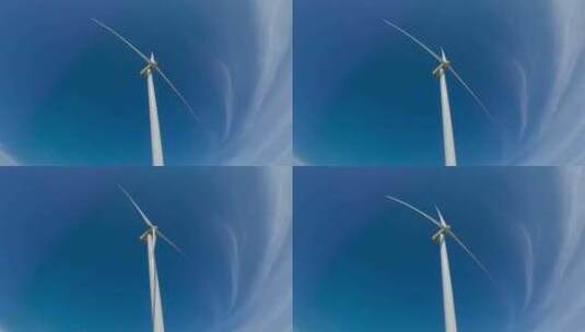 天空下的风力发电机高清在线视频素材下载