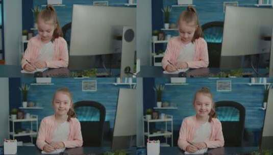 女孩在笔记本上做作业高清在线视频素材下载