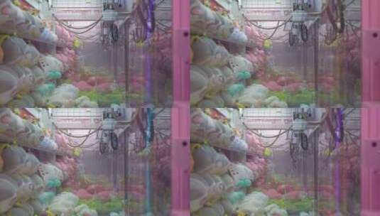潮玩电玩城游乐城商场娃娃机抓娃娃夹娃娃高清在线视频素材下载