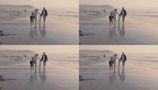 父母和孩子，在沙滩上奔跑，温馨家庭高清在线视频素材下载