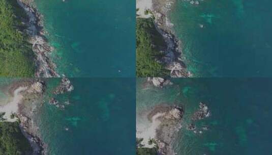 航拍三亚蜈支洲岛海浪碧绿海水礁石沙滩海浪高清在线视频素材下载